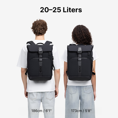 Herman Pro in Midnight Black: Backpack size shown on two models