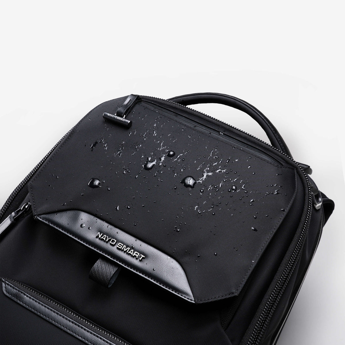 Nayo Smart Almighty A1 black business travel backpack water‑resistant surface with water droplets