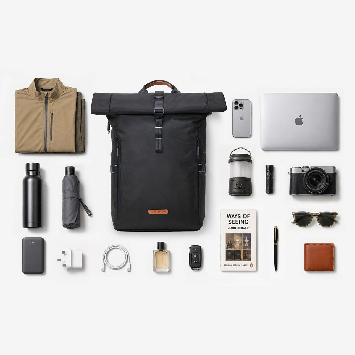 Flat-lay bundle of NayoSmart Urban U8 black roll-top backpack with laptop, clothes, water bottle, umbrella, camera and travel accessories