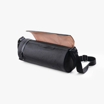Urban UL5 Cylindrical Sling Bag (Black) — Featuring a cylindrical magnetic closure design and a magnetic strip opening.