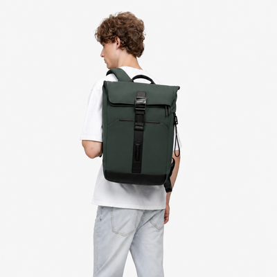 Herman Pro in Ash Green: Backpack worn by a model