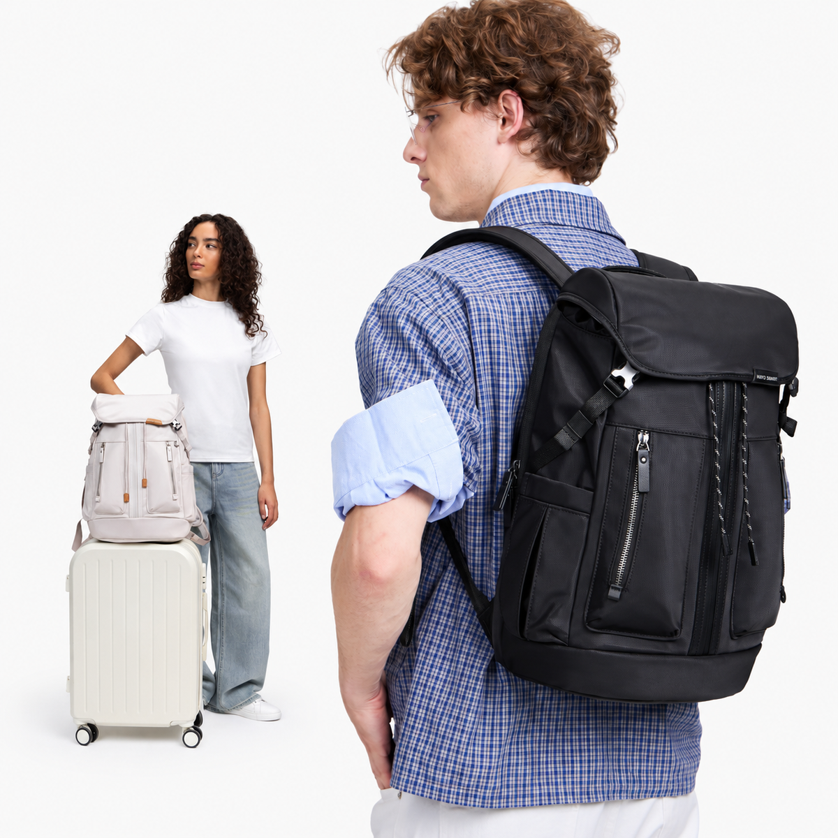 Urban U5 studio composition: large half-body man wearing black U5 in the foreground, full-body woman with off-white U5 and suitcase in the background.